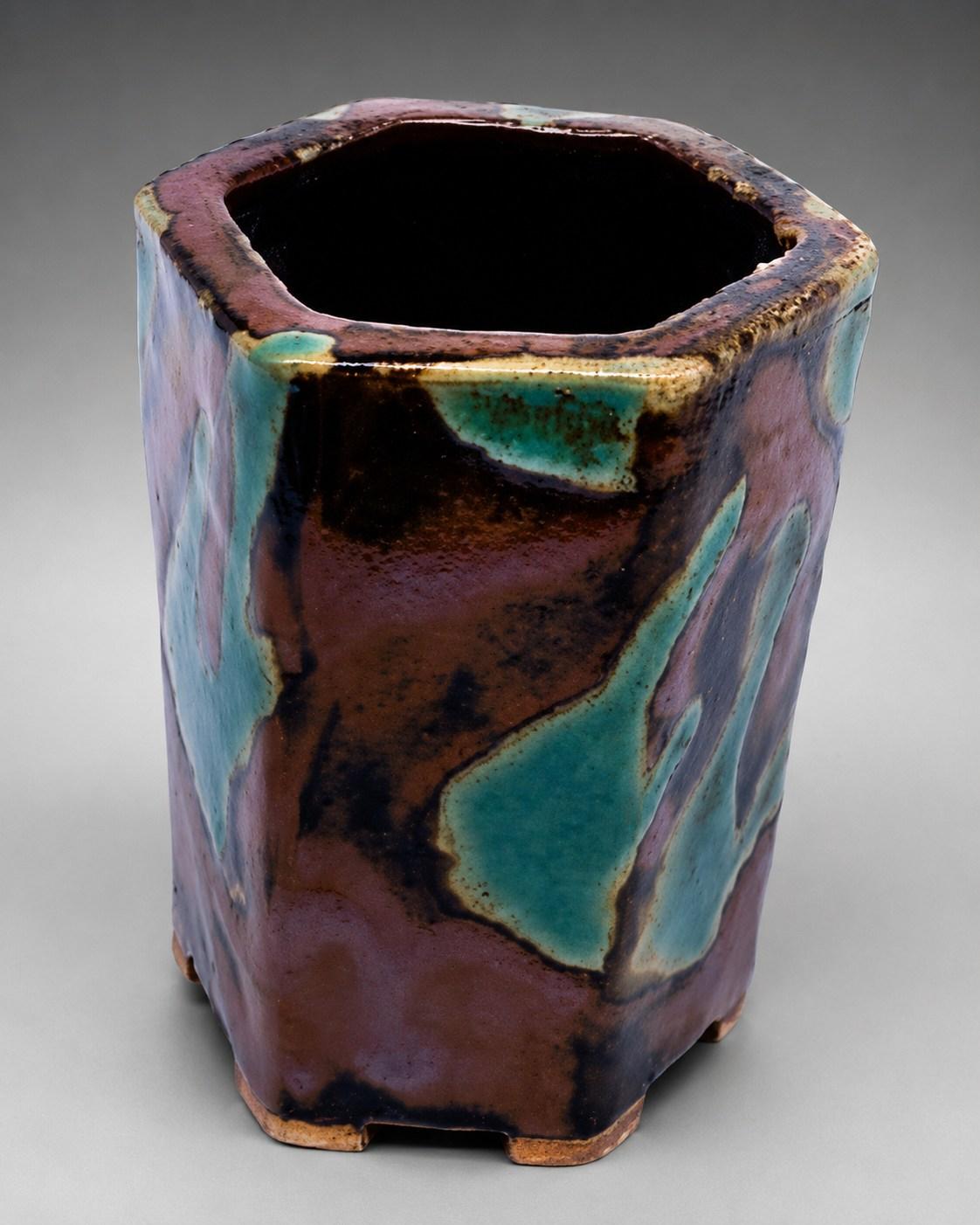 Hamada Shoji — Vase, wax resist. A Hexagonal Stoneware Vase with Abstract Wax Resist and Blue Glaze Design, Japanese stoneware, Showa period, 20th century.