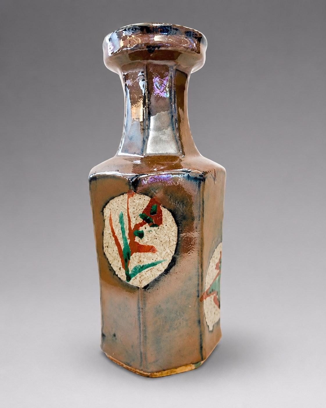 Hamada Shoji — Vase, sugar cane, wax resist. A Octagonal Stoneware Bottle Vase with Sugar Cane Motif, Japanese stoneware, Showa period, 20th century.