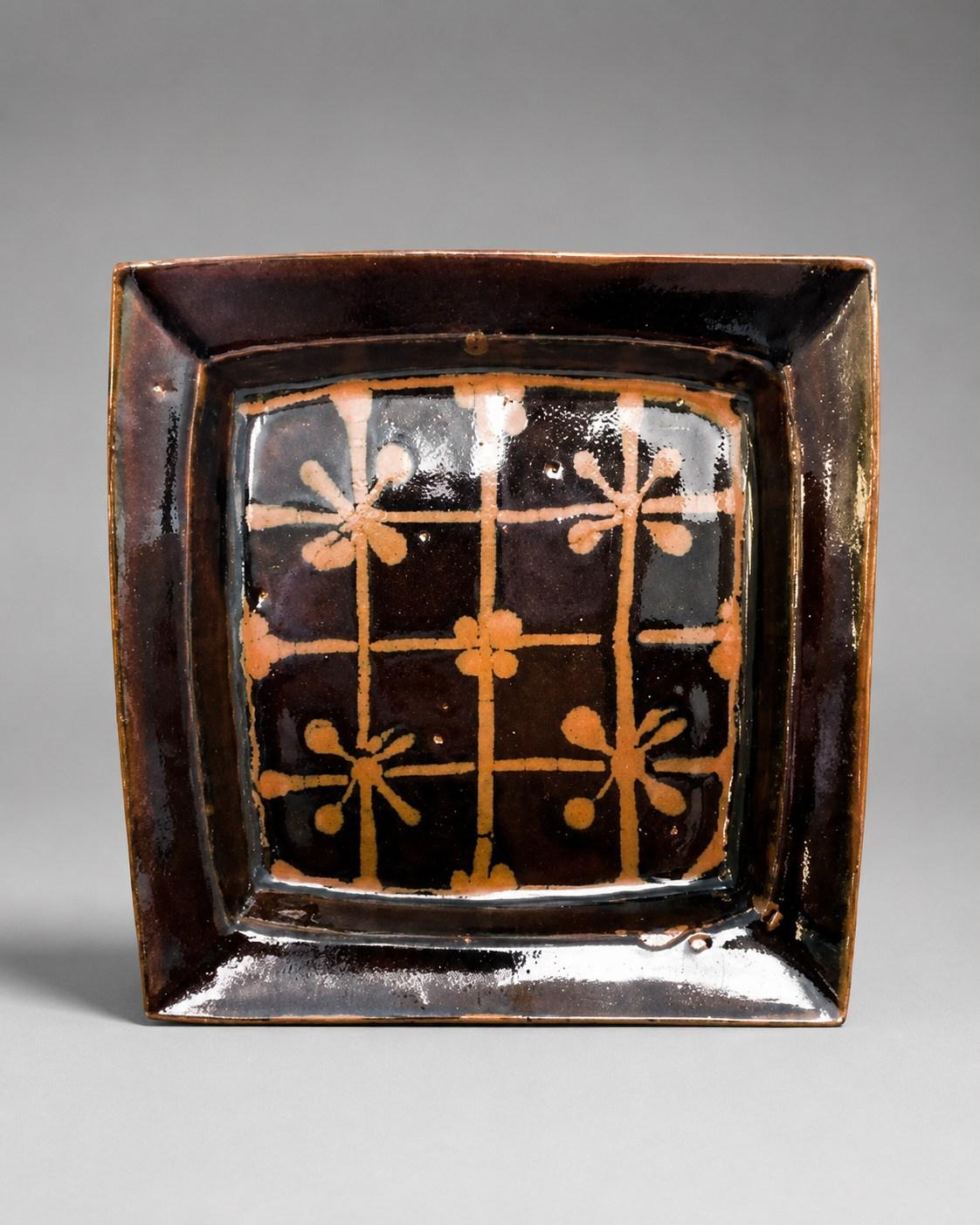 Hamada Shoji — Dish, checkered floral. A Stoneware Square Dish with Abstract Checkered Floral Design, Japanese stoneware, Showa period, 20th century.